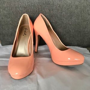Bright coral high heels